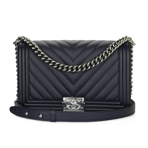 chanel navy chevron caviar boy